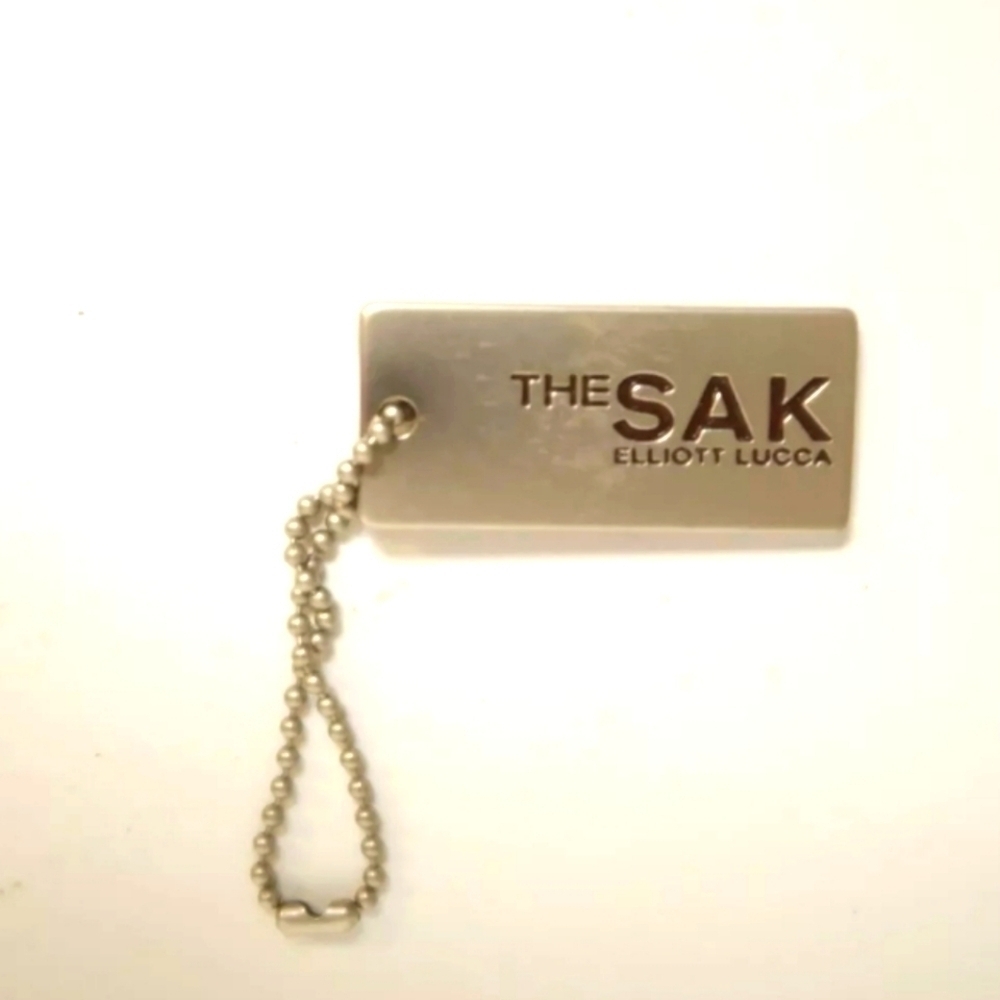 The SAK Elliot Lucca Keychain Small Silver Key Chain Clothing Accessory